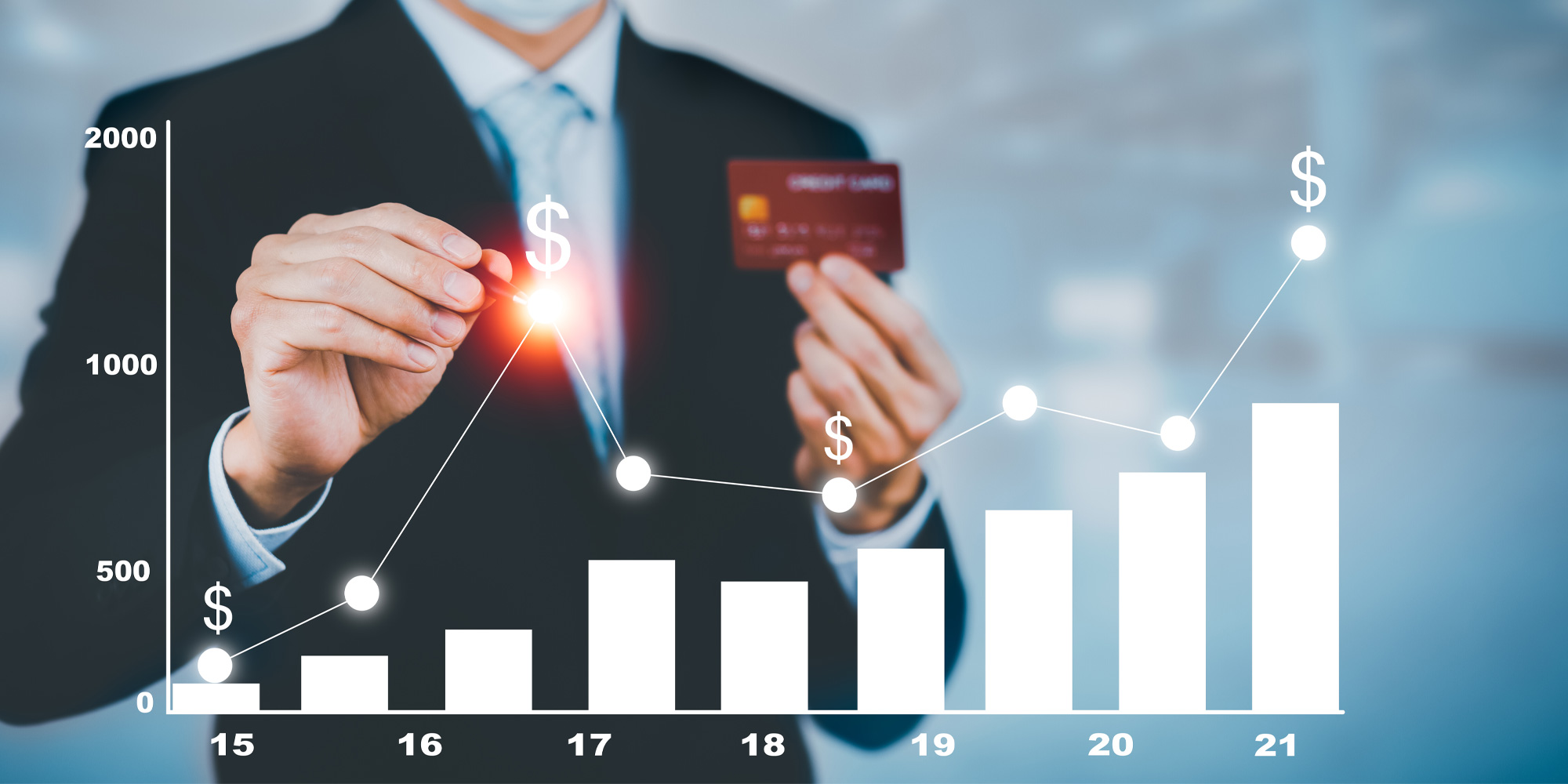 A business man contoling the grow of a chart | A business man with black suit